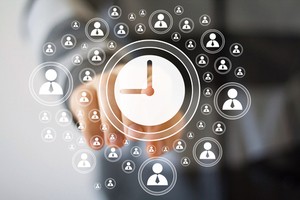 An employer pointing a finger towards time and attendance tracking software