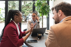 group discussing hr outsourcing in meeting