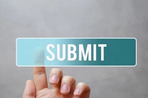 man clicking on submit button