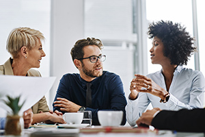 Employees talking to each other