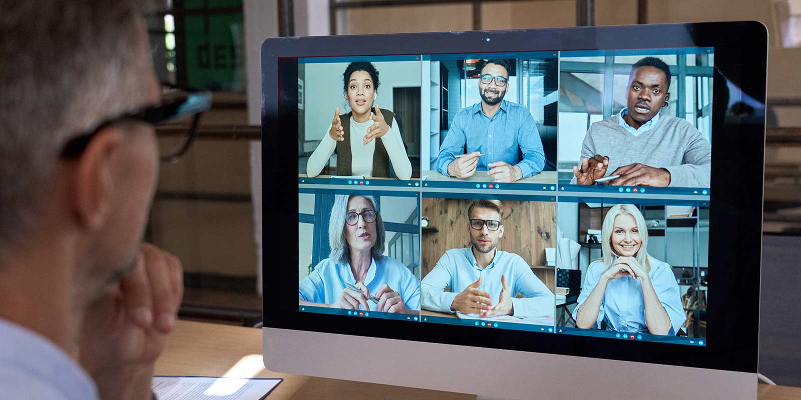 Employees working remotely on a conference call