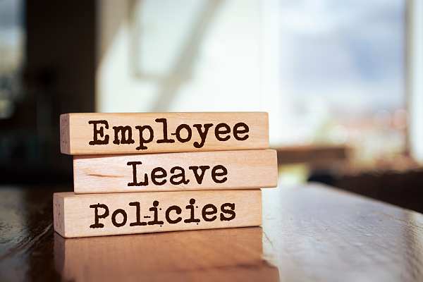 employee leave policies wooden blocks