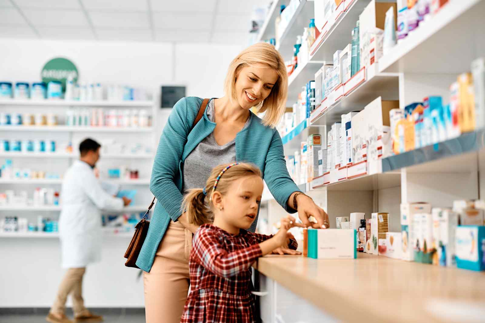 woman and daughter in pharmacy