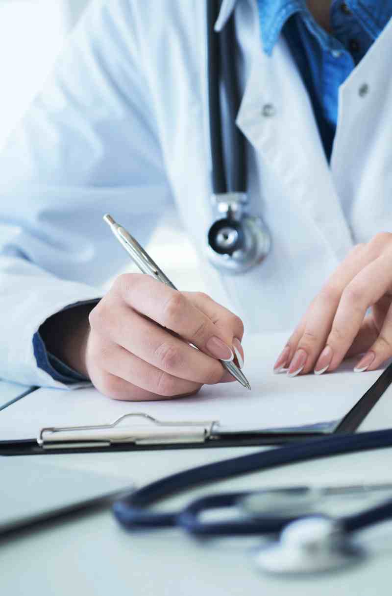 doctor writing