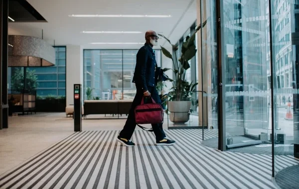 man leaving office