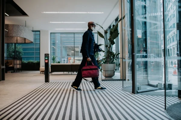 man leaving office