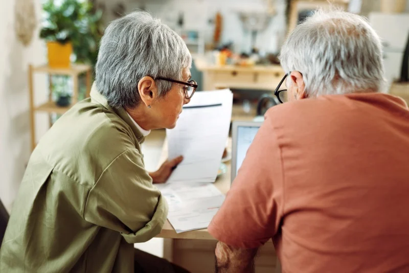 older couple looking at paperwork