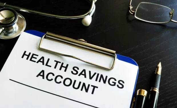 Health savings account HSA form on a clipboard