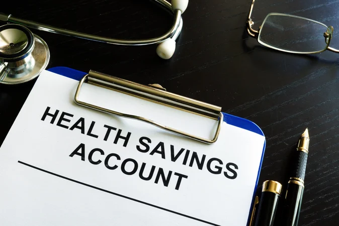 Health savings account HSA form on a clipboard