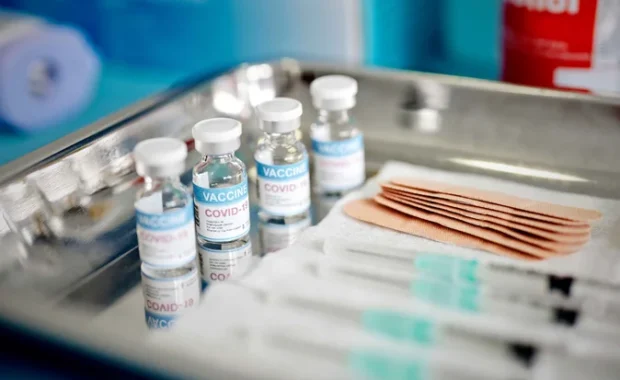 Vials-With-the-Covid-19-Vaccine-and-Syringes-are-Displayed-On-a-Tray-at-the-Corona-Vaccination-Center