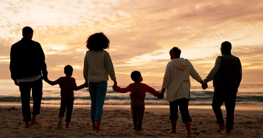 Family-Holding-Hands-Beach-1200-633