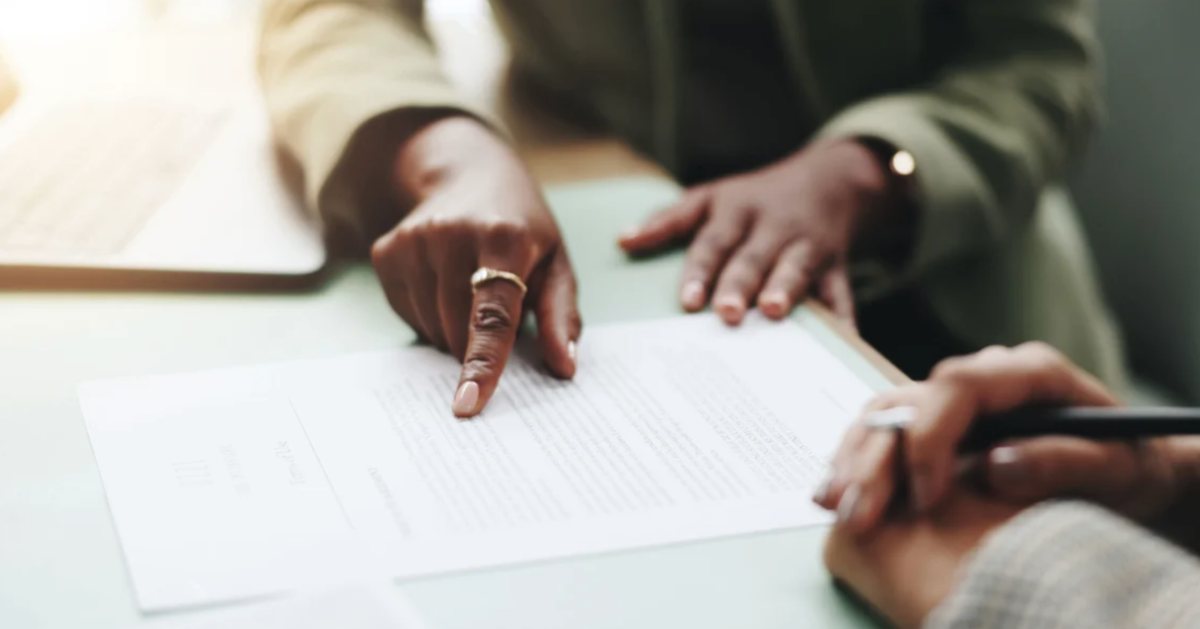 insurance agents reviewing updates to a policy