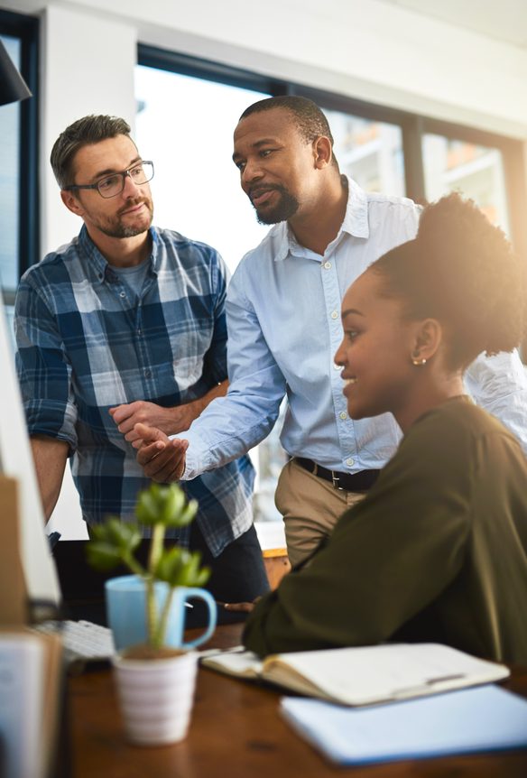 employee benefits managers reviewing strategies