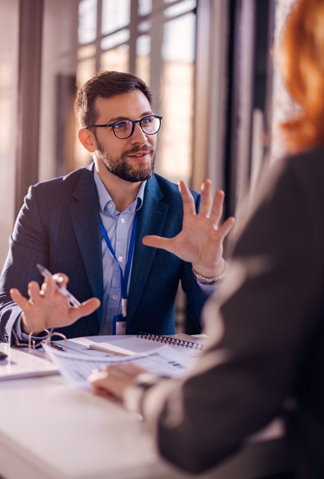 employee benefits managers reviewing strategies
