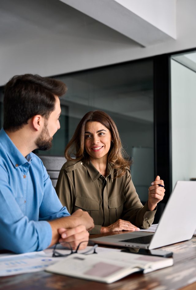 employee benefits managers reviewing strategies
